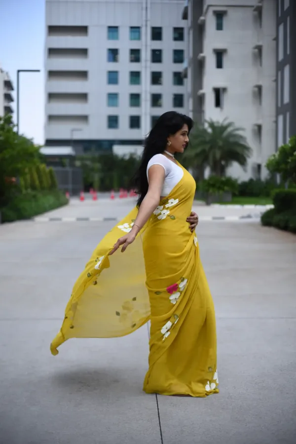 pure georgette hand painted mustard yellow saree with lily bunches