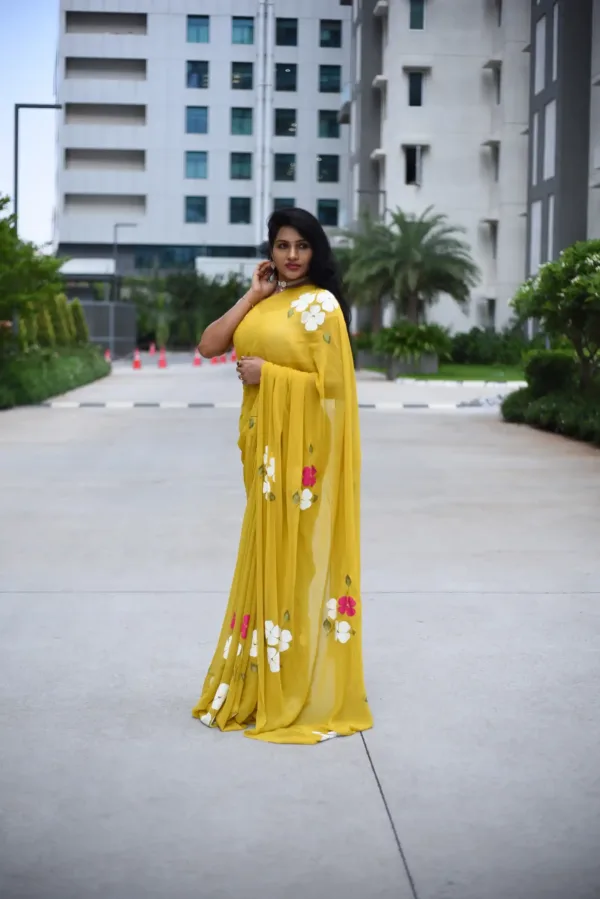 pure georgette hand painted mustard yellow saree with lily bunches