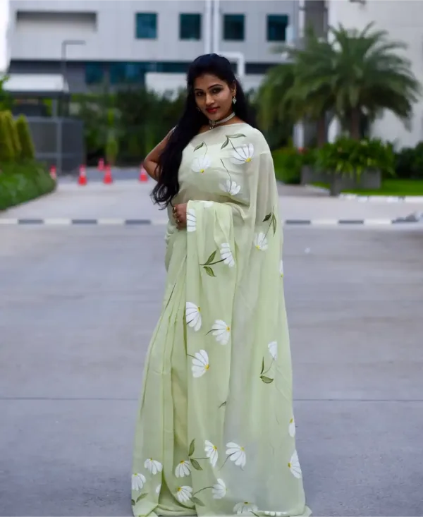 pure georgette hand painted pastel green shade saree with white Daisy bunches