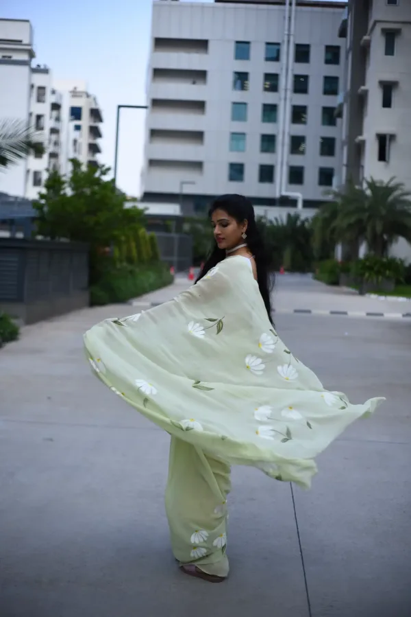 pure georgette hand painted pastel green shade saree with white Daisy bunches