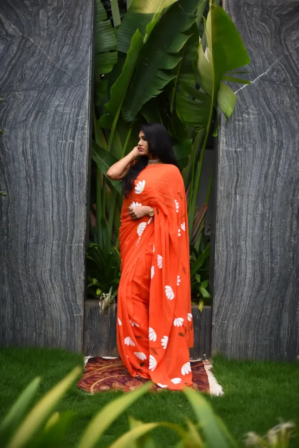 pure georgette hand painted orange saree with white Daisy bunches