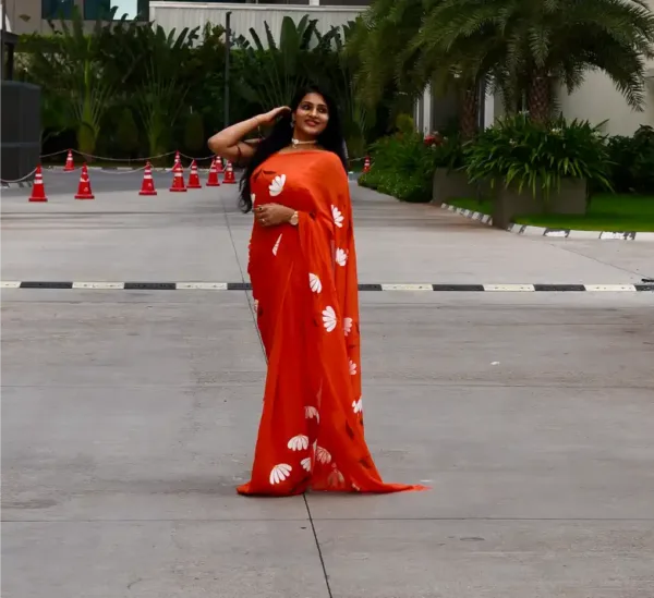 pure georgette hand painted orange saree with white Daisy bunches