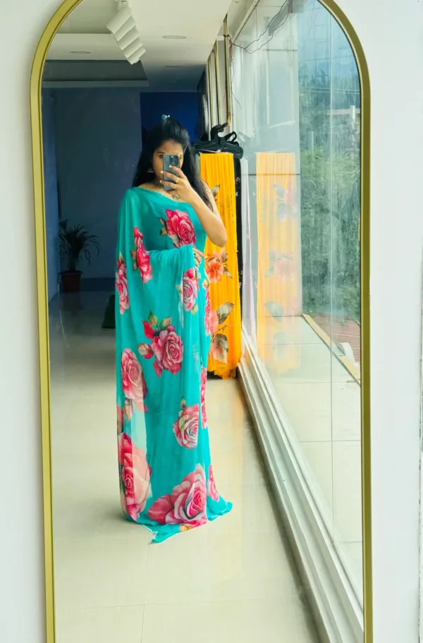 pure chiffon floral aqua blue-green saree with pink and red shaded roses