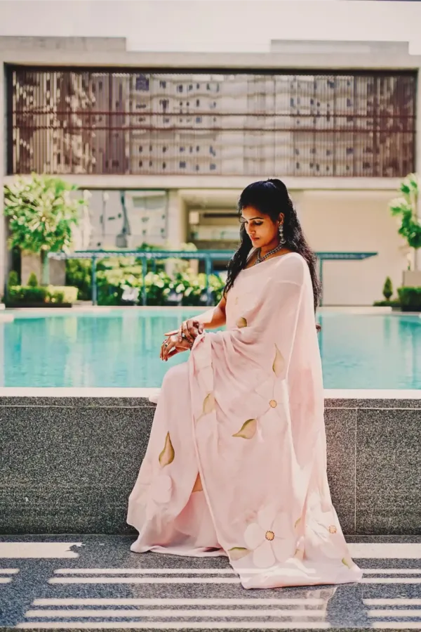 Pure georgette hand painted pink saree with floral bunches art