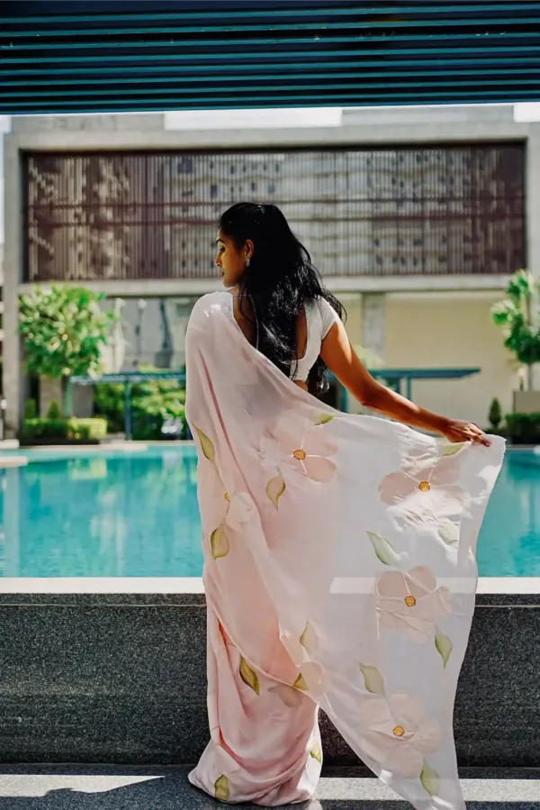 Pure georgette hand painted pink saree with floral bunches art